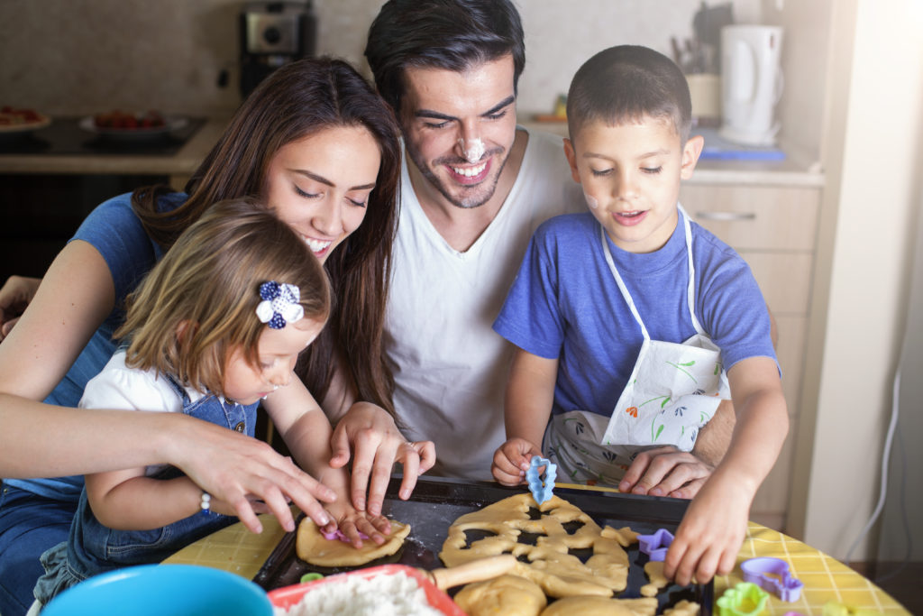 Happy family baking cookies Christian Mommy